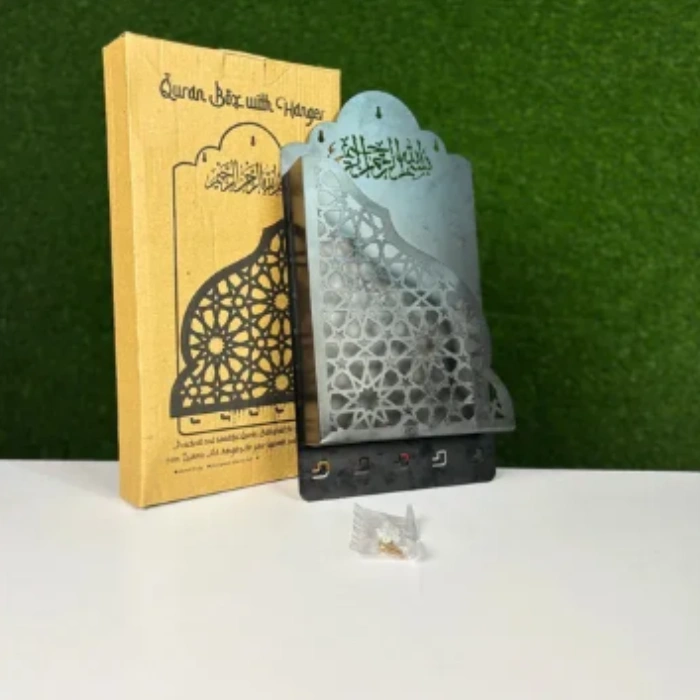 Metal Quran box with intricate design, featuring a tasbih hanger for storing prayer beads.